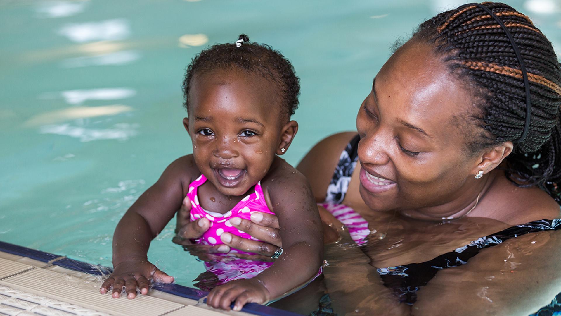 mom and tot underwater poolside